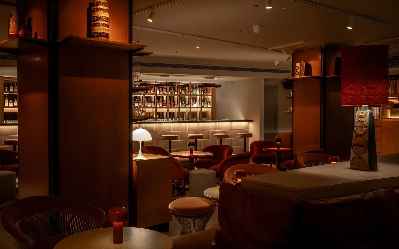 Basement backbar and velvet seating at Seed Library cocktail bar in Shoreditch, London