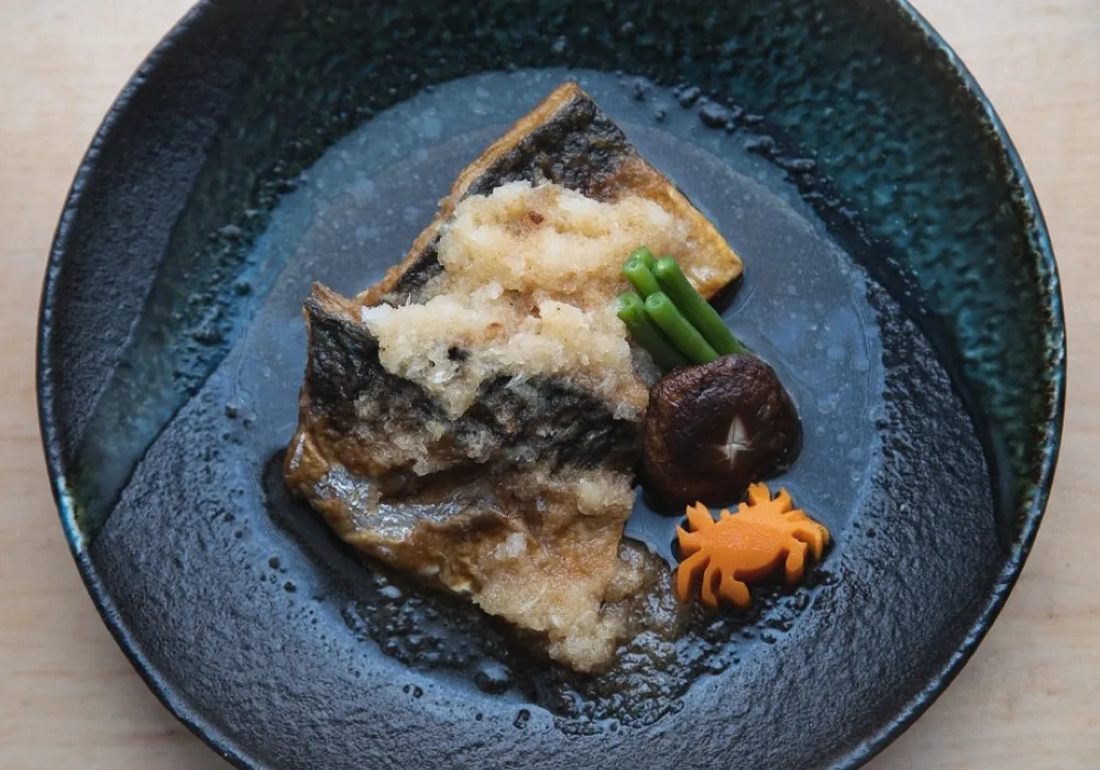 Kiku restaurant signature grilled fish dish, Mayfair London