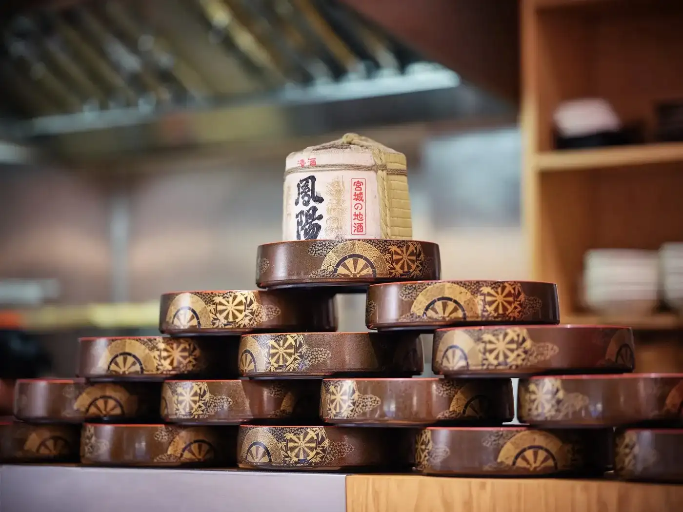 Sushi Atelier counter with lacquer boxes and sake barrel, Marylebone London