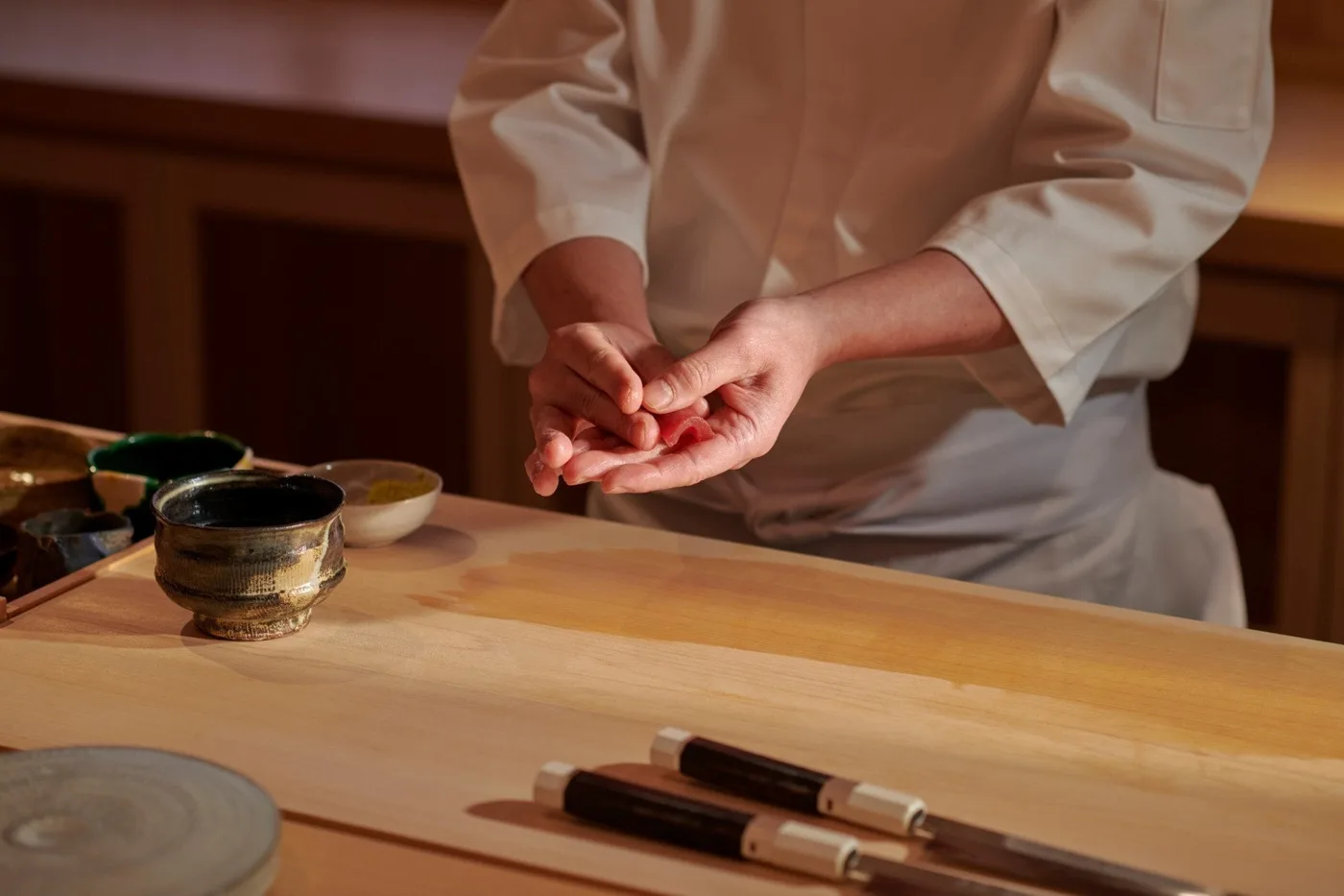 Sushi Kanesaka chef shaping nigiri at the counter, Mayfair London