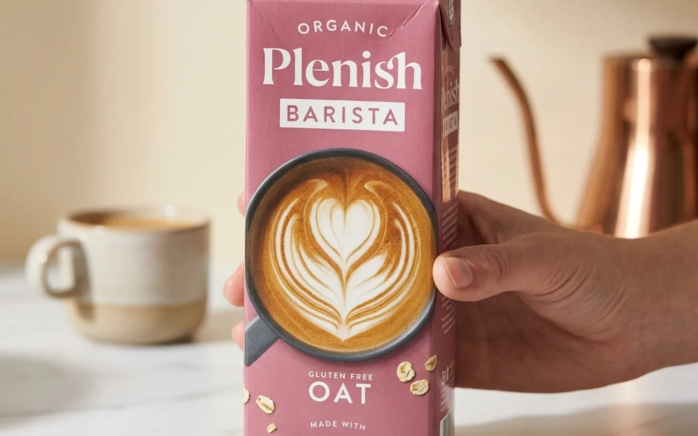 Plenish oat drink carton with minimal white labelling