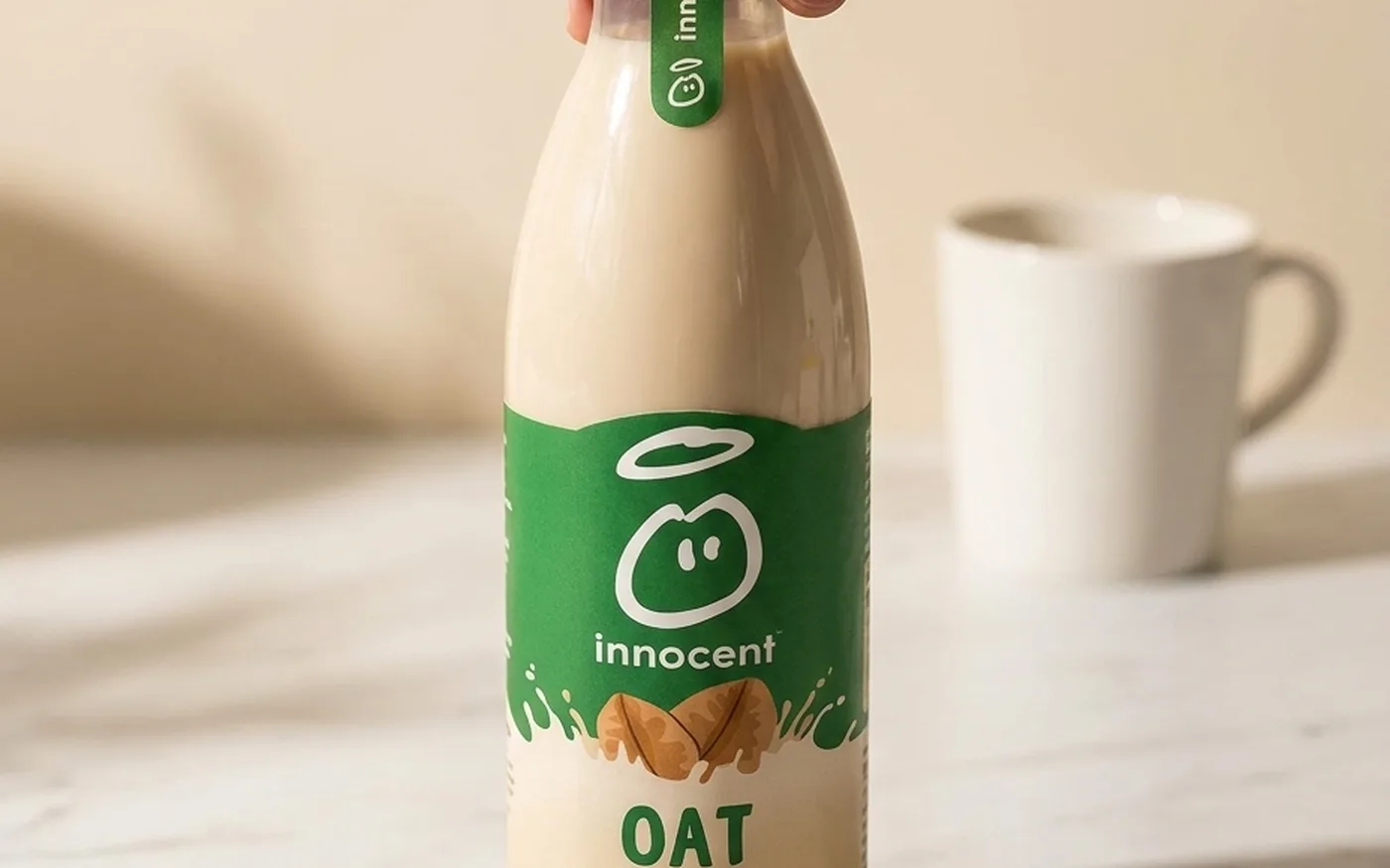 Innocent Oat Drink carton in a brightly coloured package