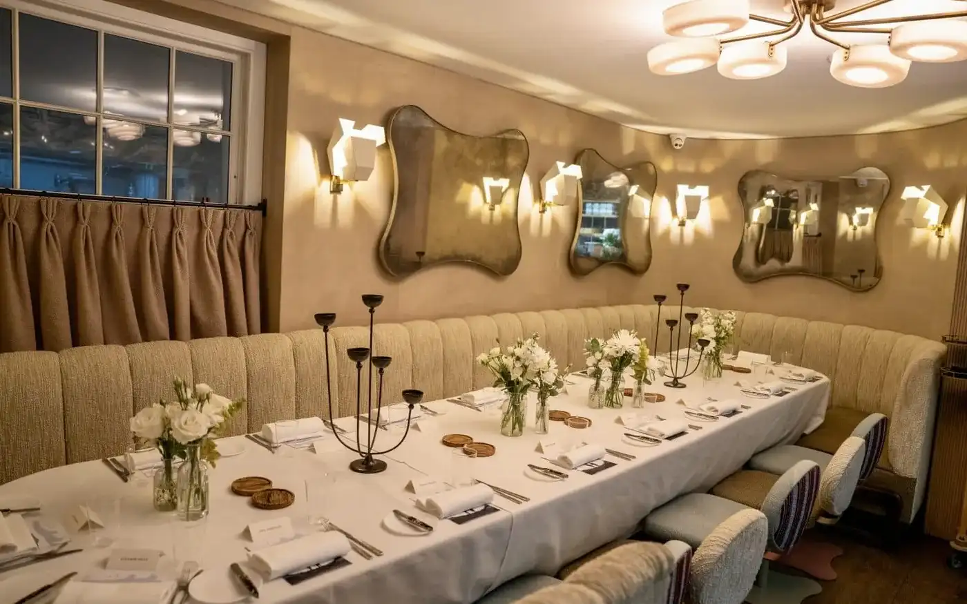 MUSE by Tom Aikens private dining room with curved banquette, London