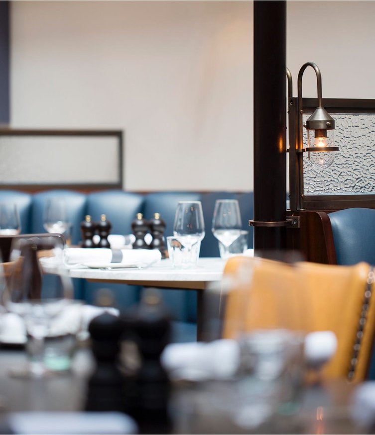 Cafe Murano restaurant interior with blue banquette seating, Covent Garden, London