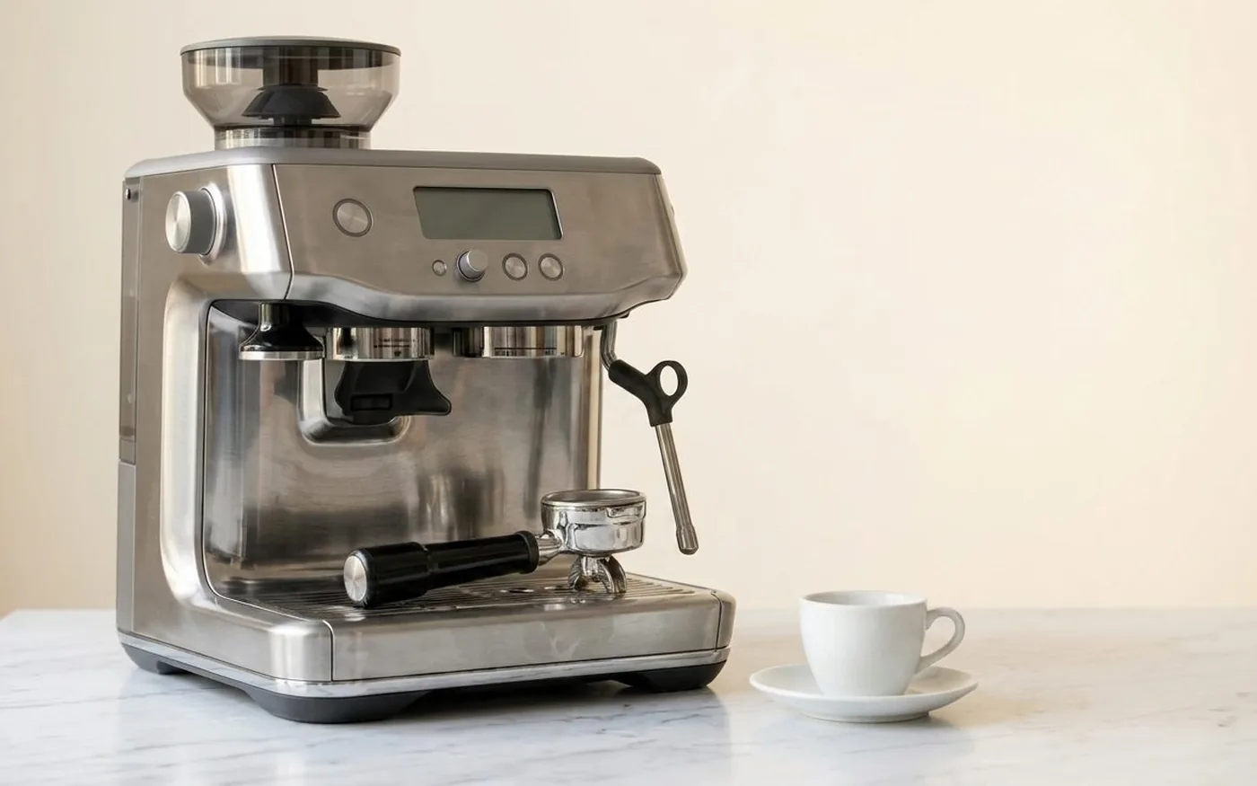 Sage Barista Pro premium espresso machine with ThermoJet heating on white marble kitchen counter
