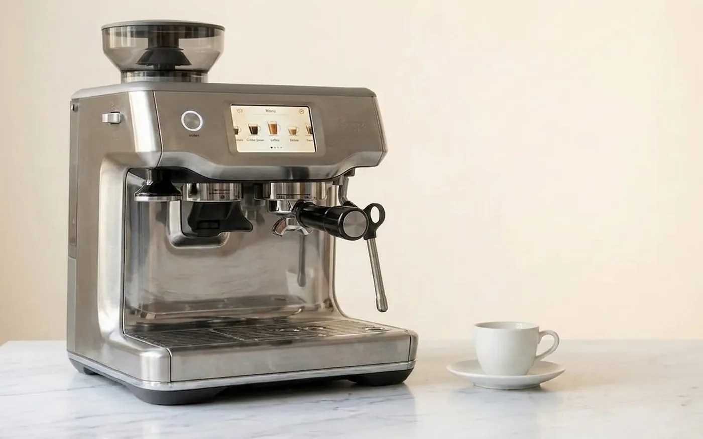 Sage Oracle Touch fully automatic dual boiler espresso machine on white marble kitchen counter