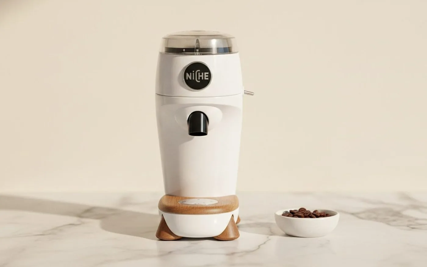 Niche Zero single-dose coffee grinder on white marble countertop