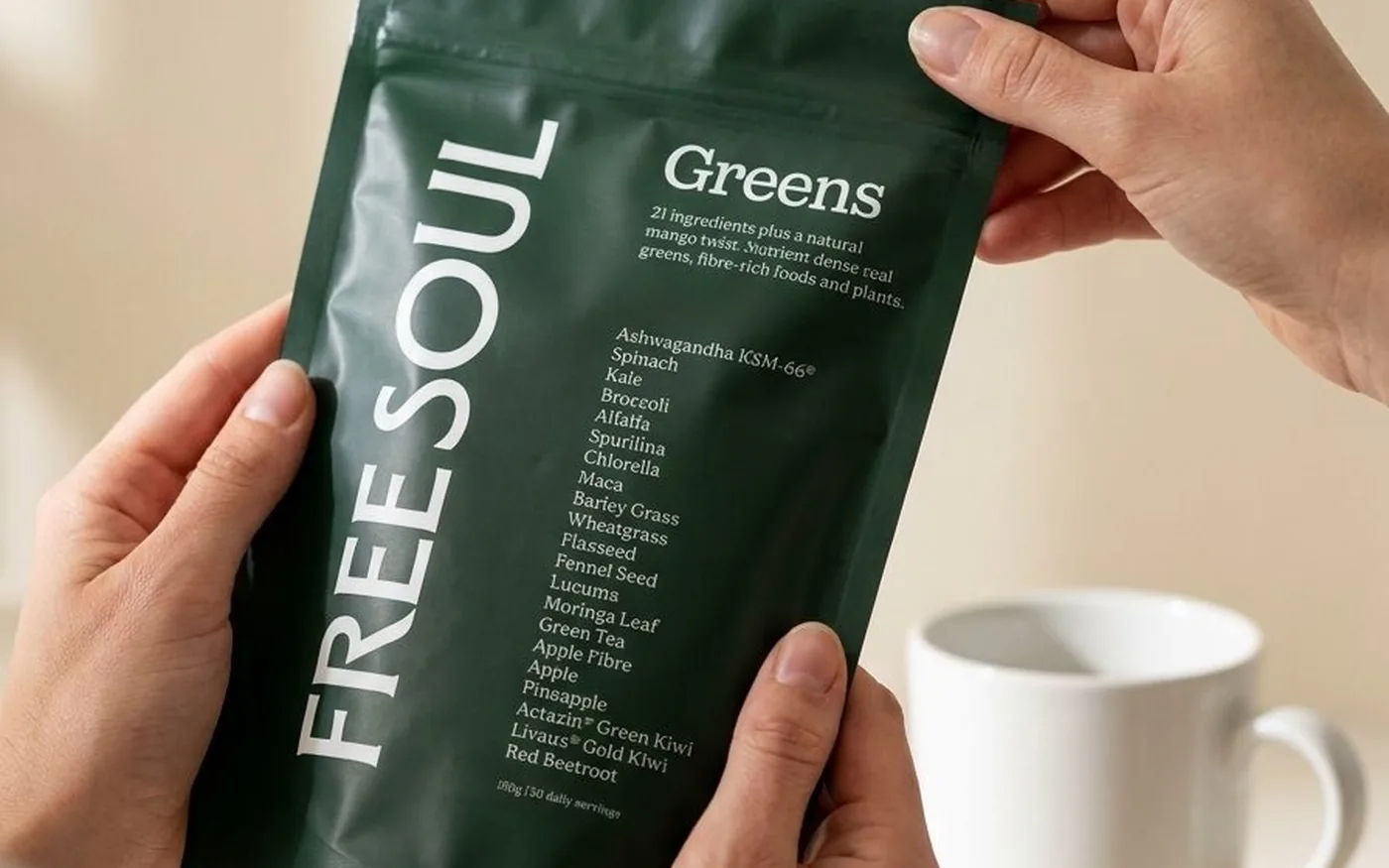 Free Soul Greens mango flavour pouch on a clean surface