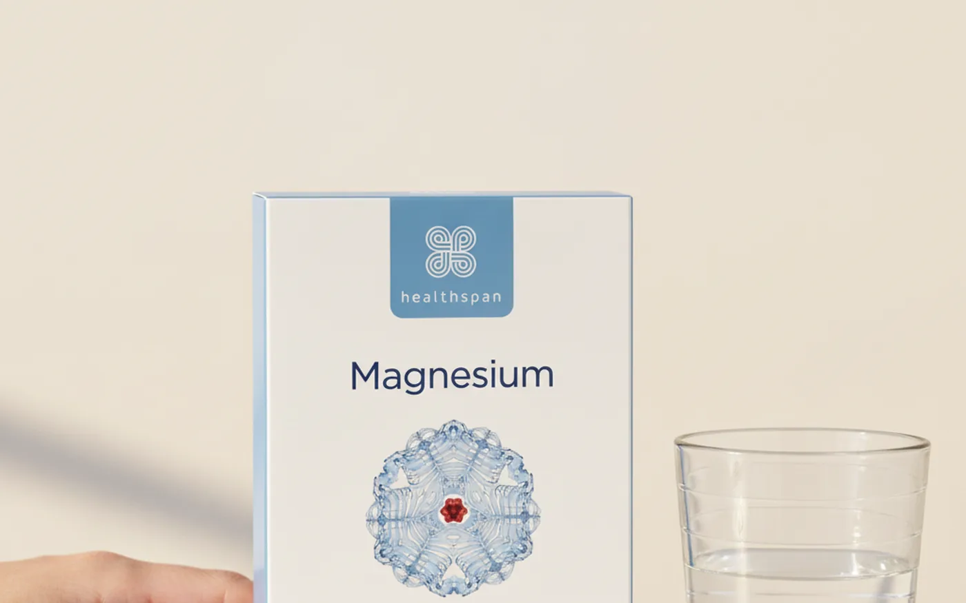 Healthspan Magnesium 375mg supplement box on white marble surface