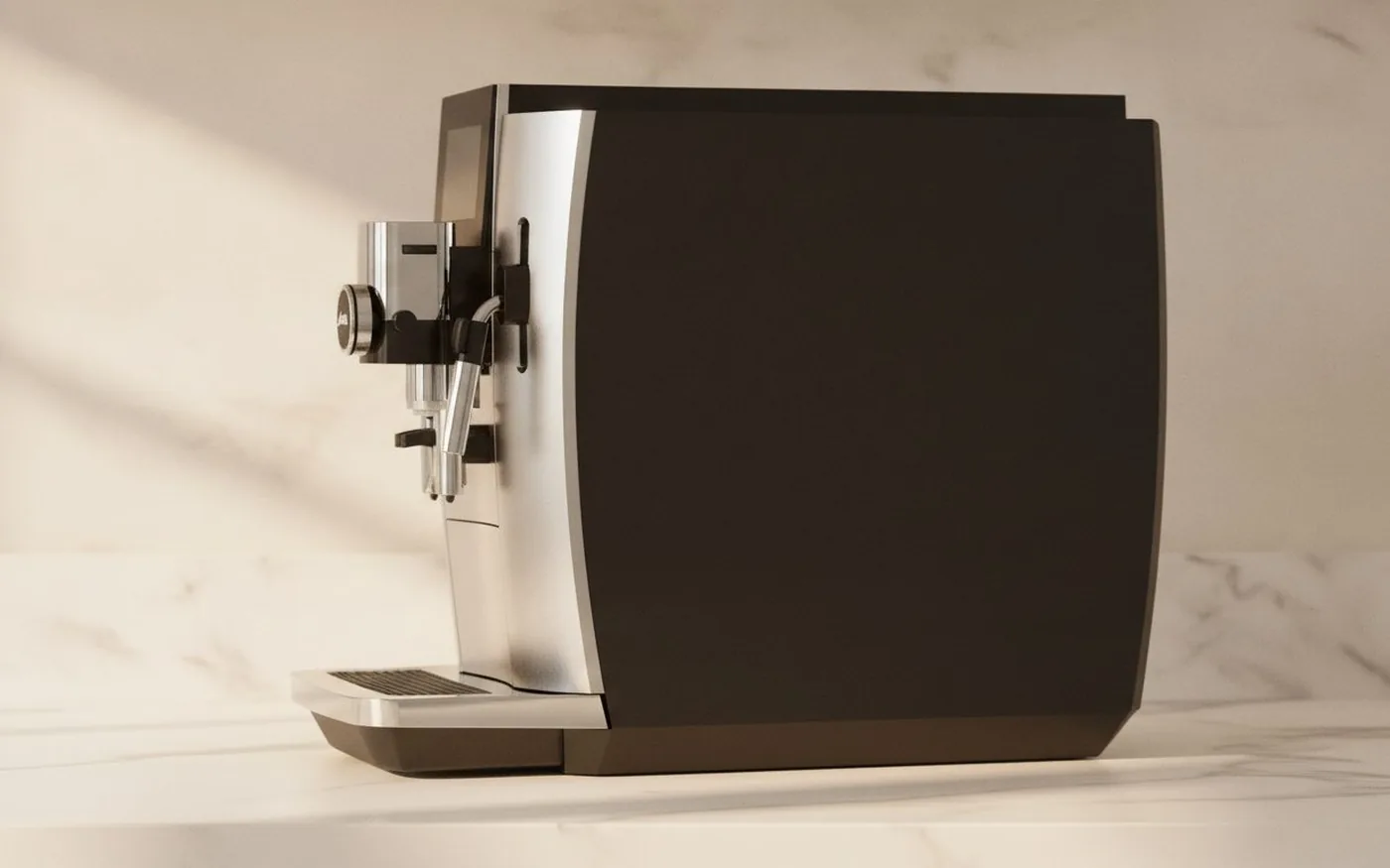 Side profile of the Jura S8 bean-to-cup coffee machine showing its rounded chrome body, height-adjustable dual spout and milk frother assembly